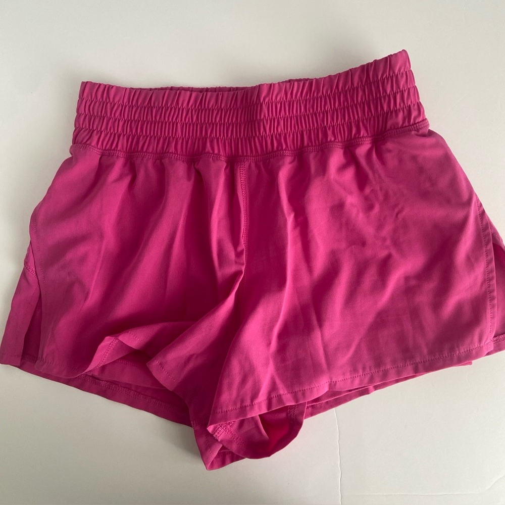 Pink flutter running shorts 90 degree by reflex, pockets, lined, size Medium